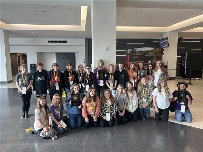 Gilbert Jr. BETA members show off awards at the recent BETA State Convention.